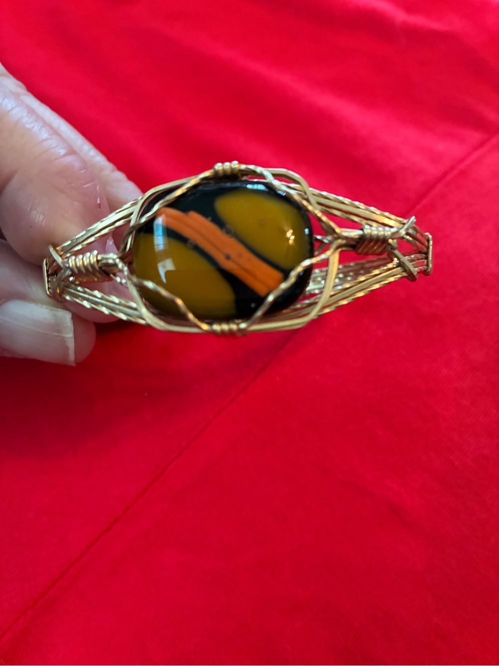 Gold Wire Wrapped Bangle with Black and Amber Glass Cabochon